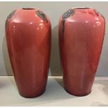 A PAIR OF EARLY 20TH CENTURY MOORCROFT VASES Of tapering circular form, the shoulders decorated with