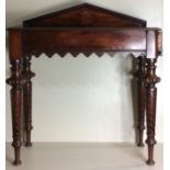 A VICTORIAN MAHOGANY SIDE TABLE Having a carved decorative frieze and raised on turned legs. (approx