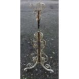 A VICTORIAN WROUGHT IRON TELESCOPIC OIL LAMP (Possibly W.A.S. Benson?).