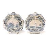 A pair of continental pottery moon flasks, decorated with a lady and gent, 23cm high