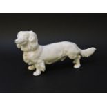 A Meissen white porcelain dachshund. N24024cm long