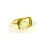 A gold hammered chequer citrine ring, tested as approximately 18ct gold