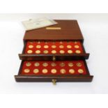 Our Royal Sovereigns collection of gilt coins by Danbury Mint, seventy coins in a fitted case