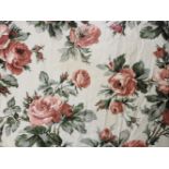 A pair of rose decorated lined and interlined curtains, together with a matching bedspread,