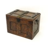 An Arts & Crafts oak casket, with iron strapwork