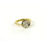 A gold diamond cluster ring, one stone deficient, tested as approximately 18ct