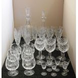 A collection of cut glass, and two decanters