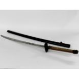 A Wakizashi, the blade marked marked to the tang, Kiyomitsu, probably 17th century, with iron and