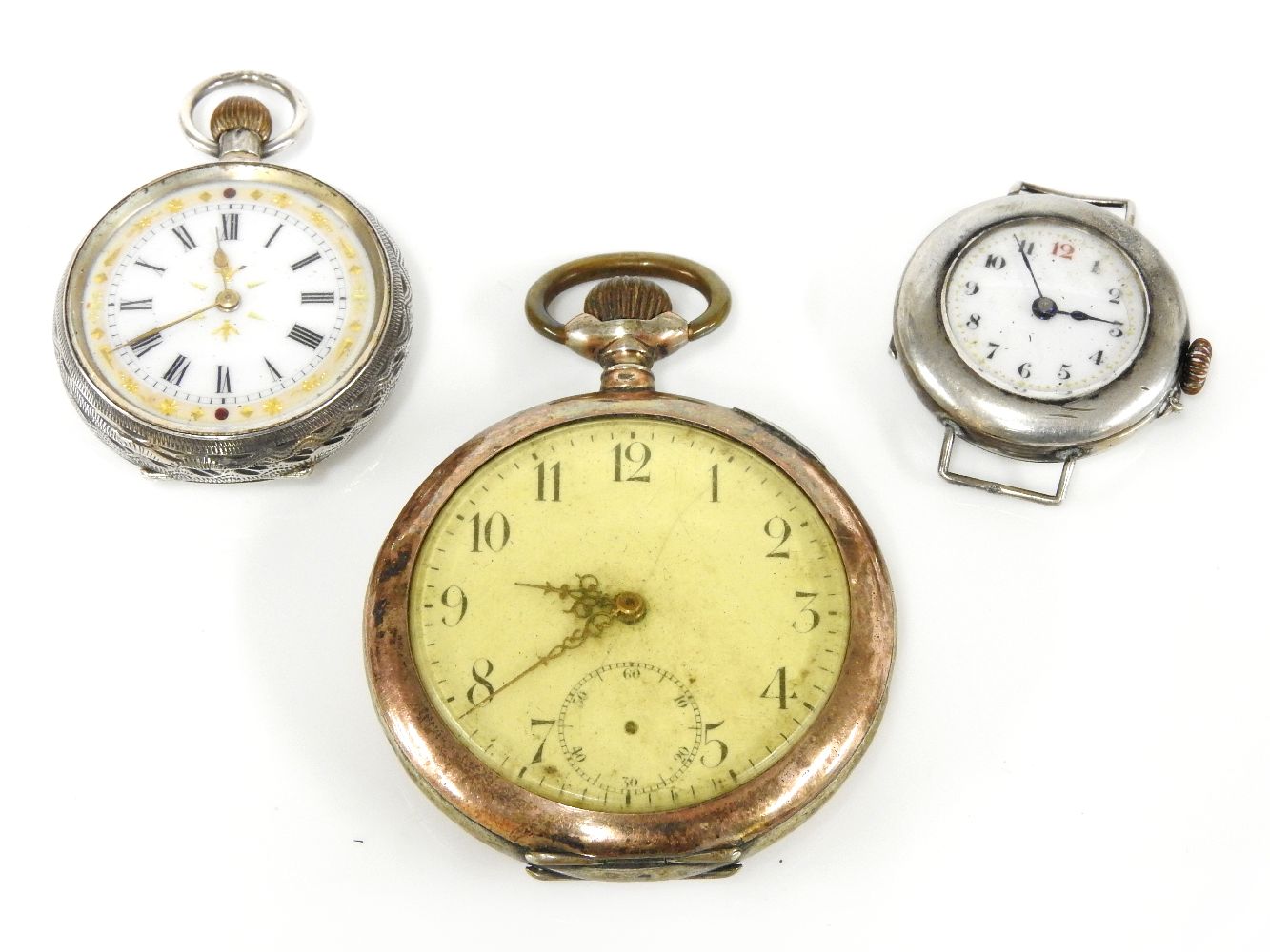 A silver open faced pocket watch, a Continental ladies silver pocket watch, with white enamel