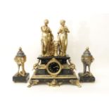 A Victorian black marble and gilt mantel clock, with two gilt spelter figures and a pair of non