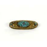 A Victorian gold brooch, set with a rose cut diamond and turquoise cabochons, marked 15ct