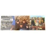 Seven Beatles LPs, including Sergeant Pepper, Rubber Soul, Revolver, Hard Days Night, With The