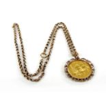 A gold belcher chain, and a gold sovereign pendant in mount