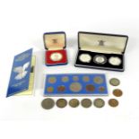 A collection of coins to include:a three coin silver proof set commemorating the allied invasion