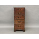 A George III oak chest of five drawers