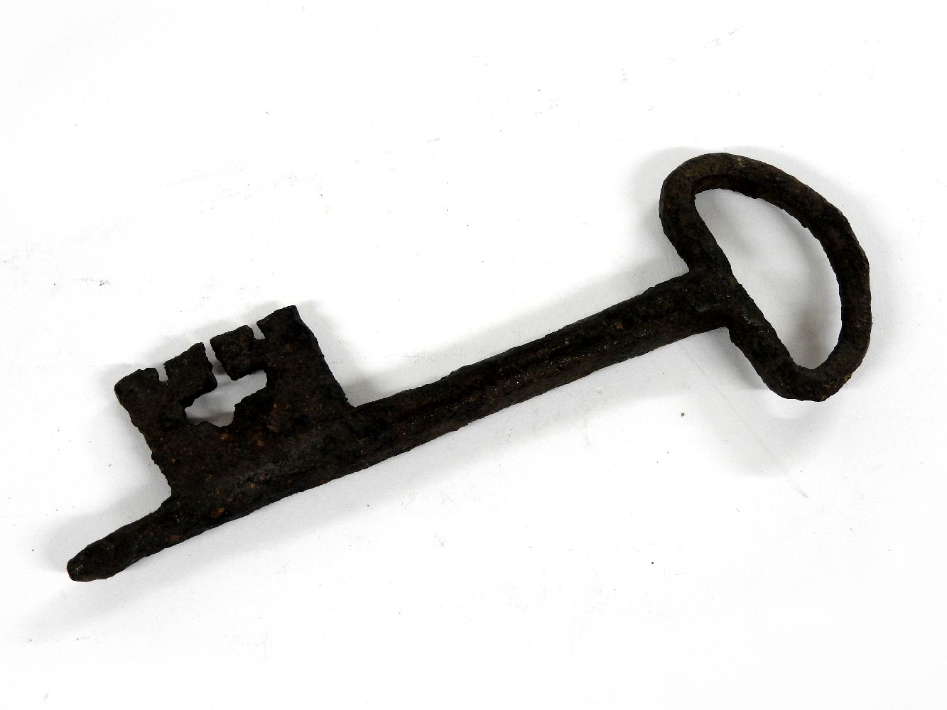 A large iron key, probably 15th century, 20cm long