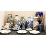 Oriental ceramics: six dishes, two teapots, mug, pair of blue and white vases and six larger