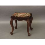 A 19th century mahogany stool, with cabriole legs
