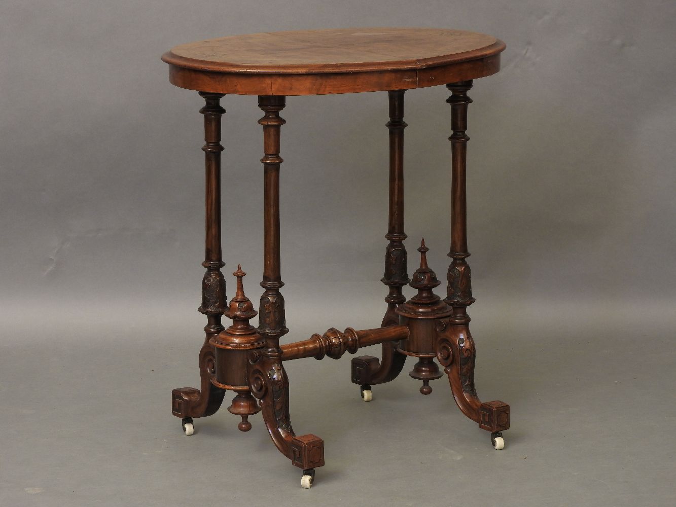 A Victorian inlaid walnut occasional table