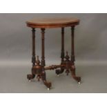 A Victorian inlaid walnut occasional table
