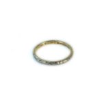 A 22ct gold hand engraved wedding ring, faced with platinum, 3.23g