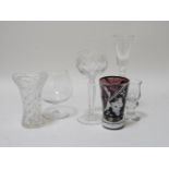 A set of six champagne glasses with spiral twist stems, and a collection of drinking glasses and