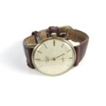 A 9ct gold gentleman's Fortex mechanical strap watch, with textured dial, with baton numerals
