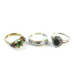 A 9ct gold dyed green quartz and white stone ring, a gold enamel floral ring, tested as