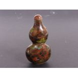 A Cloisonné double gourd snuff bottle, with florets, matching stopper, 8.5cm high