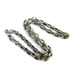 A gold hollow fancy trace watch chain, marked 9ct, 16.63g