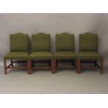 A set of four Georgian style mahogany and green upholstered side chairs, each 60cm wide