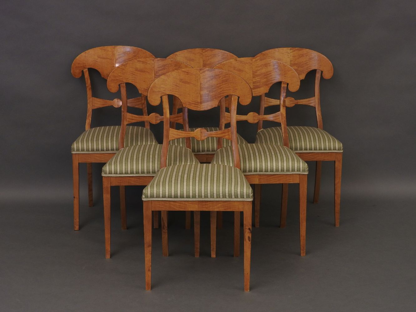 A set of 10 Biedermeier style satinwood dining chairs