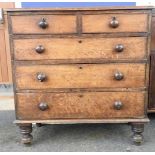 A Victorian oak chest of two drawers over three drawers
