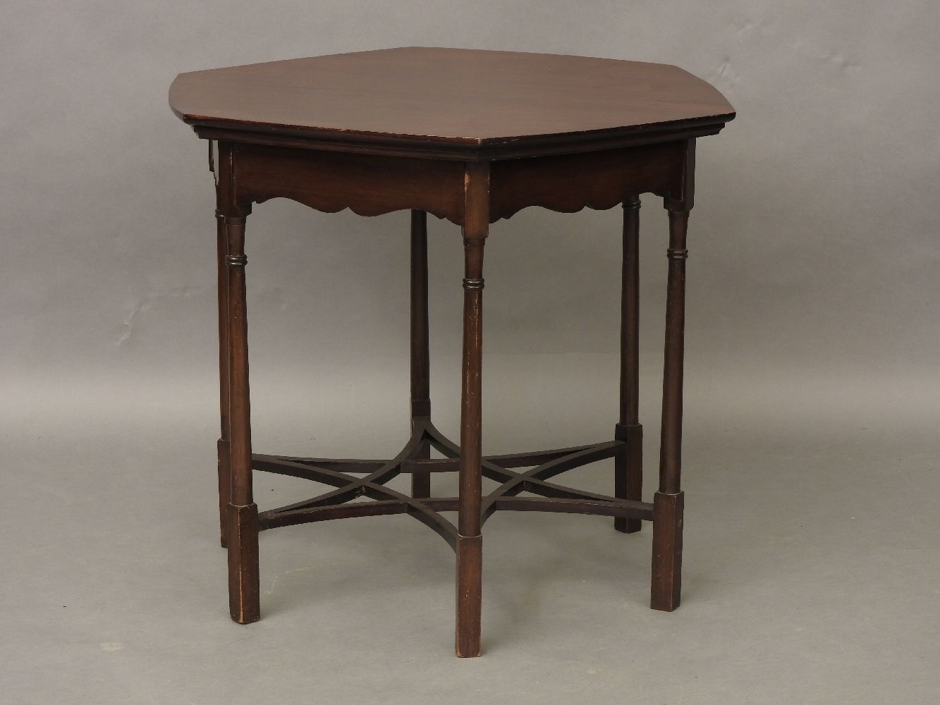 An Arts and Crafts style octagonal centre table