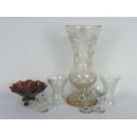 A Carnival glass bowl together with a large cut glass vase, two smaller vases and a pair of 19th