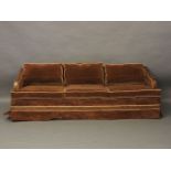 An Art Deco sofa, with walnut arms