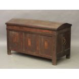A 17th century style oak dome topped coffer