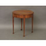 A small circular fruitwood occasional table, with single drawer, on tapering legs