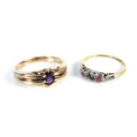 A gold single stone amethyst ring, tested as approximately 9ct, 4.00g, a gold three stone ring,