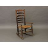 An elm and ash ladderback rocking chair