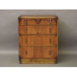 An Art Deco figured walnut chest of drawers