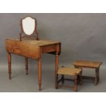 A Victorian mahogany Pembroke table, a shield shaped dressing mirror and two stools (4)