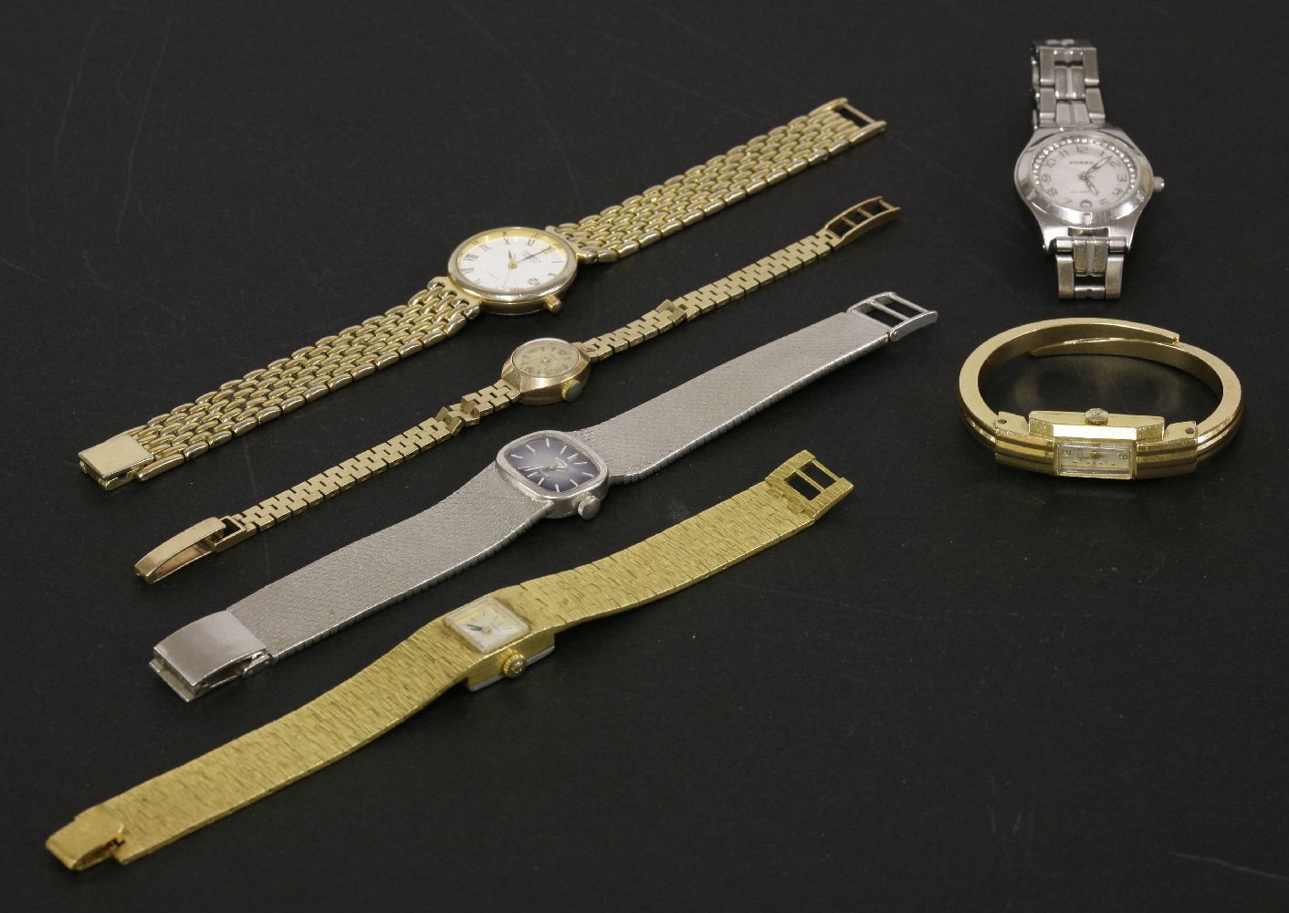 A ladies gold plated Favre Leuba mechanical bangle watch, a ladies 9ct gold Accurist bracelet watch,