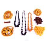 A collection of Bakelite and early plastic beads, to include a single row of faceted graduated