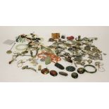 A back and front paste and split pearl locket, and a large quantity of assorted costume jewellery,