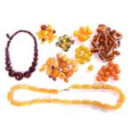 A collection of Bakelite and early plastic beads and necklaces, to include a single row faceted