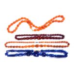A single row blue Bakelite bead necklace, a single row of graduated barrel shaped Bakelite bead