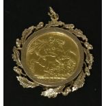 A 1910 full sovereign in 9ct gold mount pendant, 11.93g, damaged