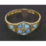 A Victorian 15ct gold diamond and turquoise cluster ring, with turquoise set shoulder, dated 1850,