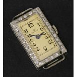A ladies 18ct white gold Rolex Prima diamond set mechanical cocktail watch, c.1920. Rectangular
